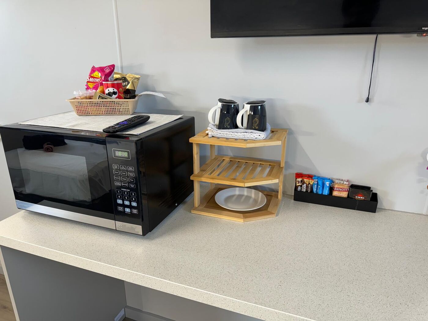 Kitchenette with microwave, tea station and welcome snacks
