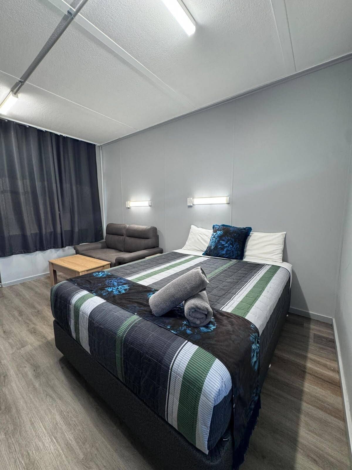 Standard Queen Room with double bed and lounge
