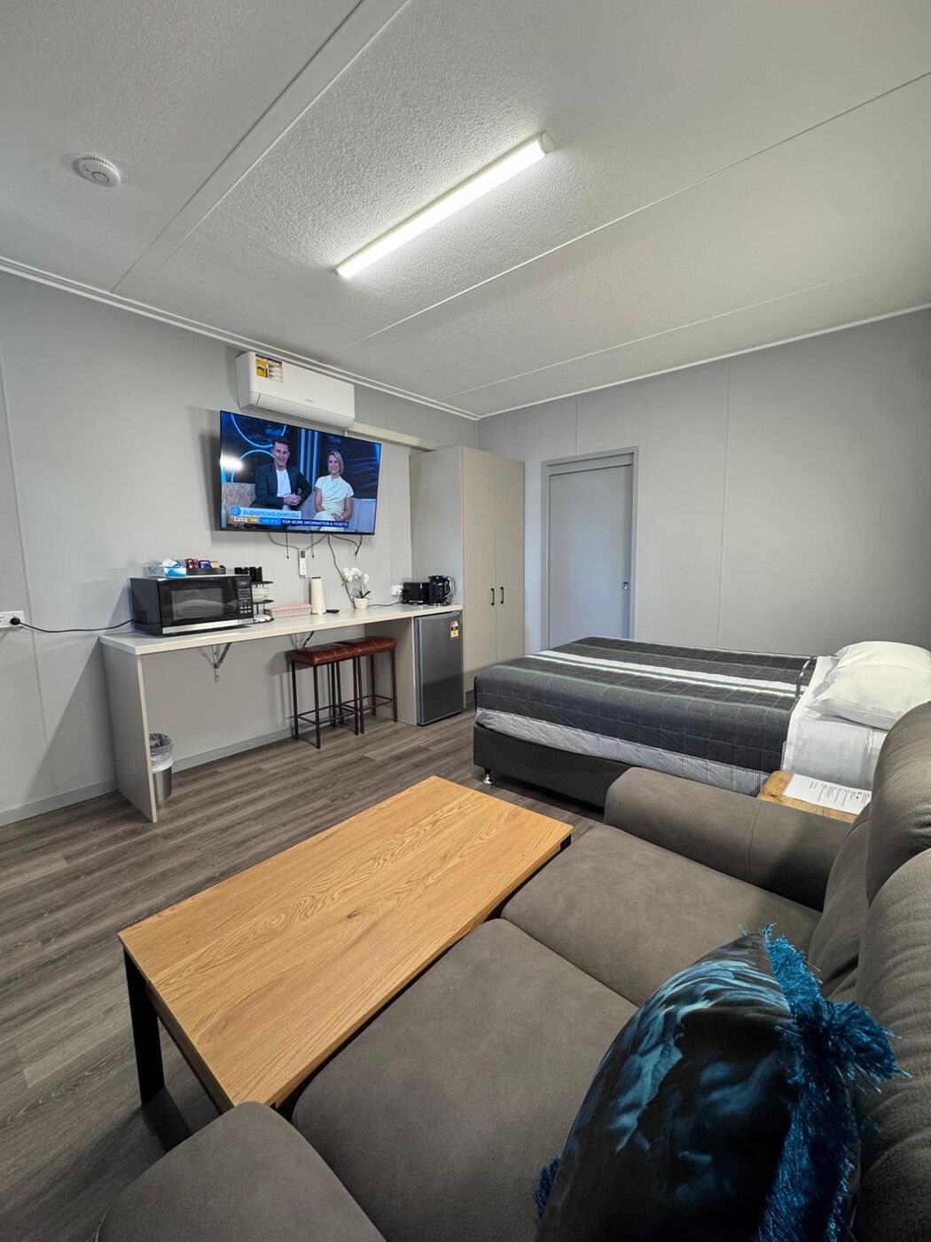 Fully renovated room with new TV and furnishings